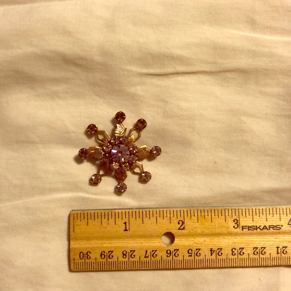 Purple and gold costume brooch